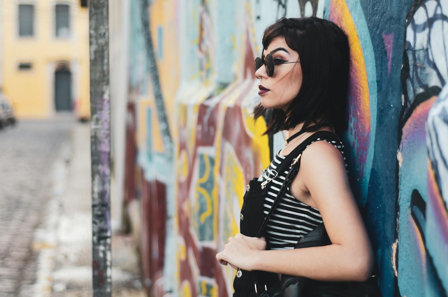 Woman Leaning on Wall